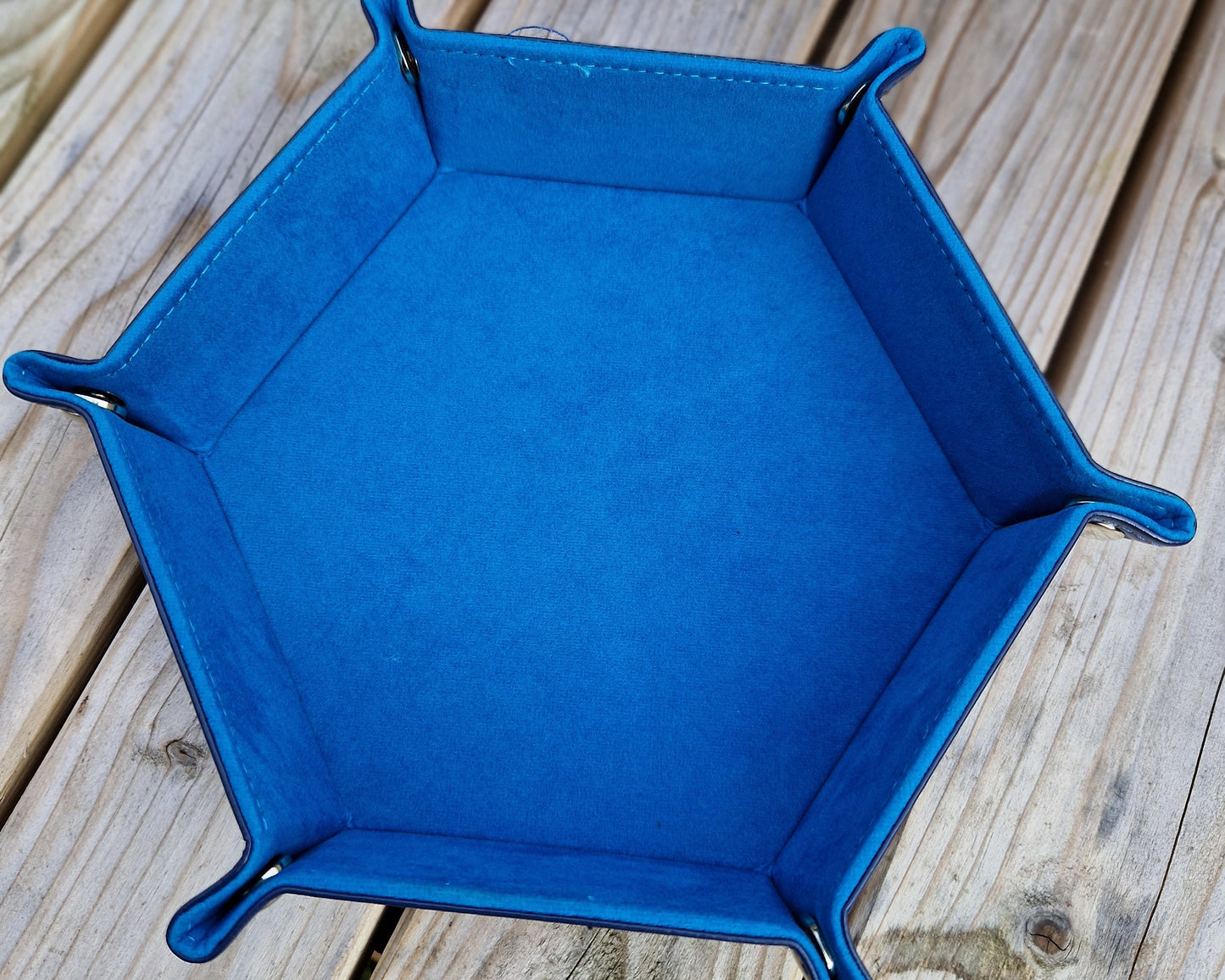 Hexagonal dice rolling tray in blue