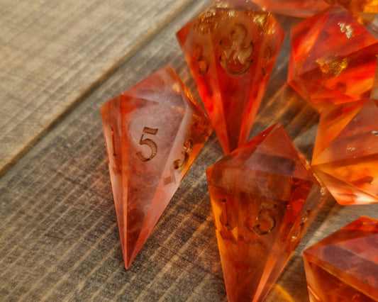 Orange and gold d6 fireball dice