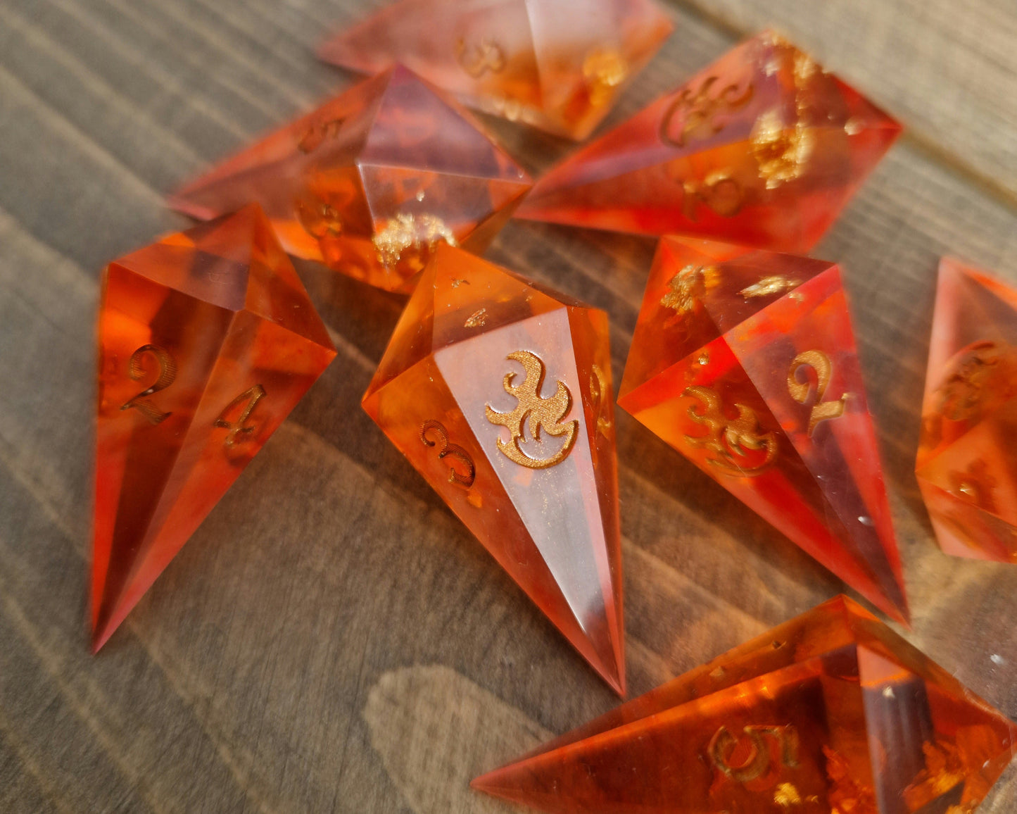 Orange and gold d6 fireball dice