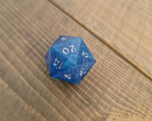 Blue and purple resin dice with silver numbers
