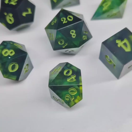 Green resin dice on a turntable