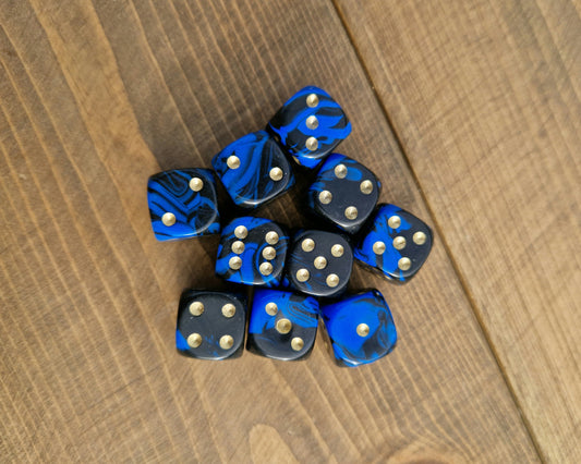blue and black d6 spot dice with gold dots