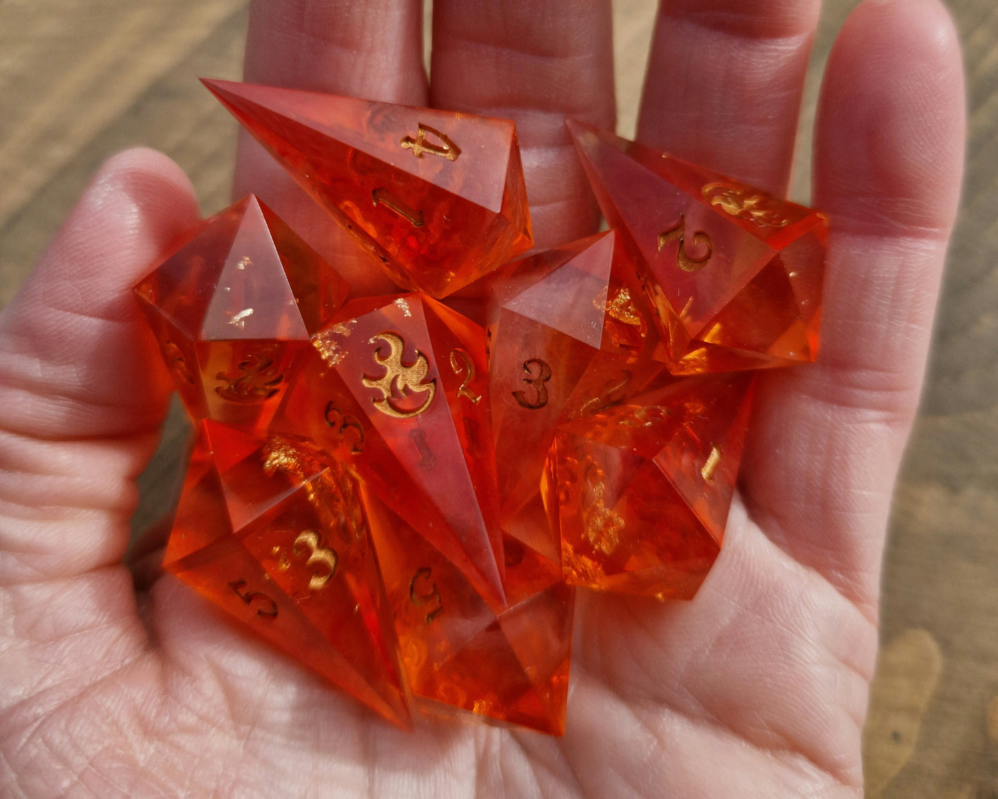 Orange and gold d6 fireball dice